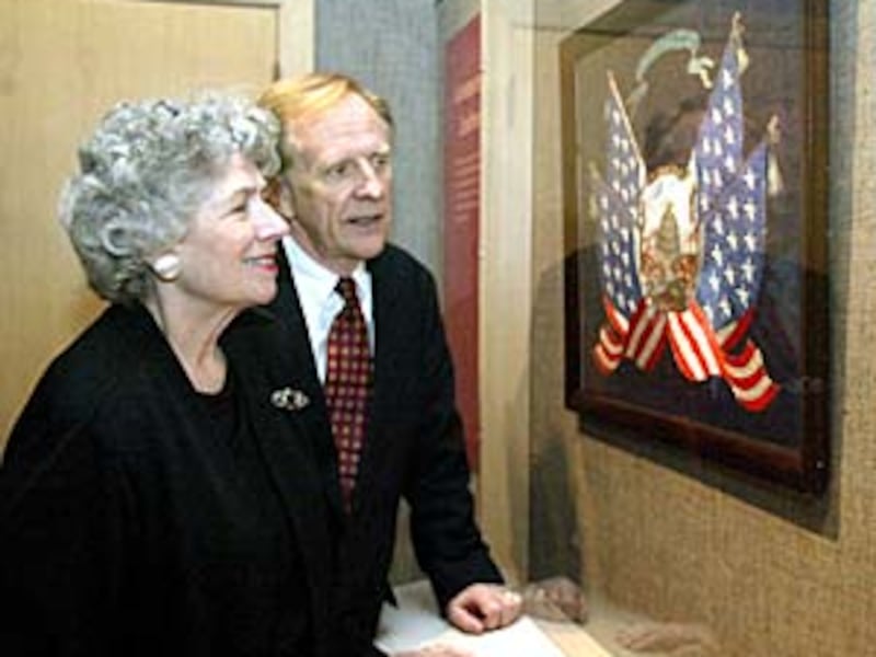 Claudia and Richard Bushman of New York City view recently opened needlework exhibit at the Museum o