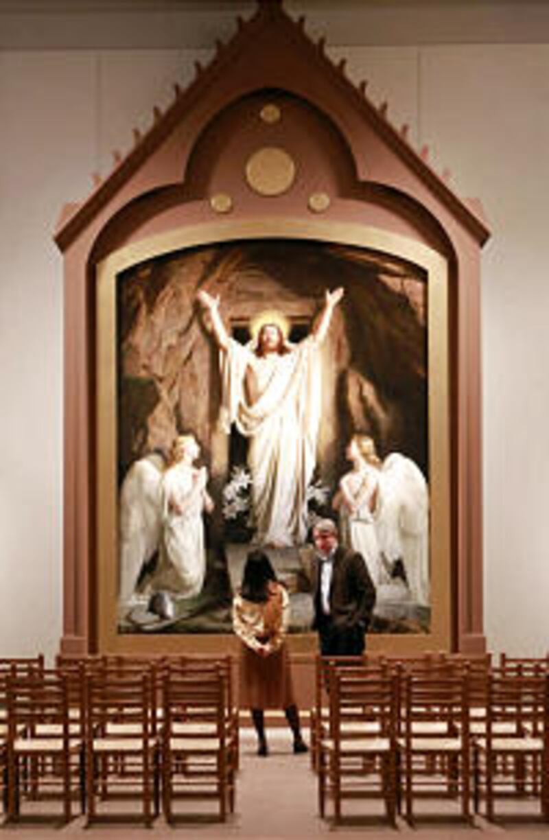 People look at The Resurrection, by Carl Bloch, at a new exhibition, Sacred Gifts: The Religious Art