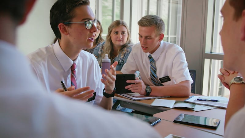 Missionaries interact in a classroom during the filming of a new video at the Provo Missionary Training Center in Provo, Utah, in November 2025.