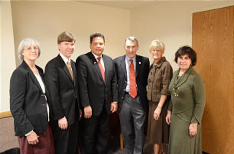 President Bruce Priday of the Lenexa Kansas Stake, President Van Komen of the Missouri Independence