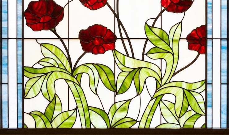 Art-glass designs of the native chocolate cosmos flower inside the San Luis Potosí Mexico Temple.
