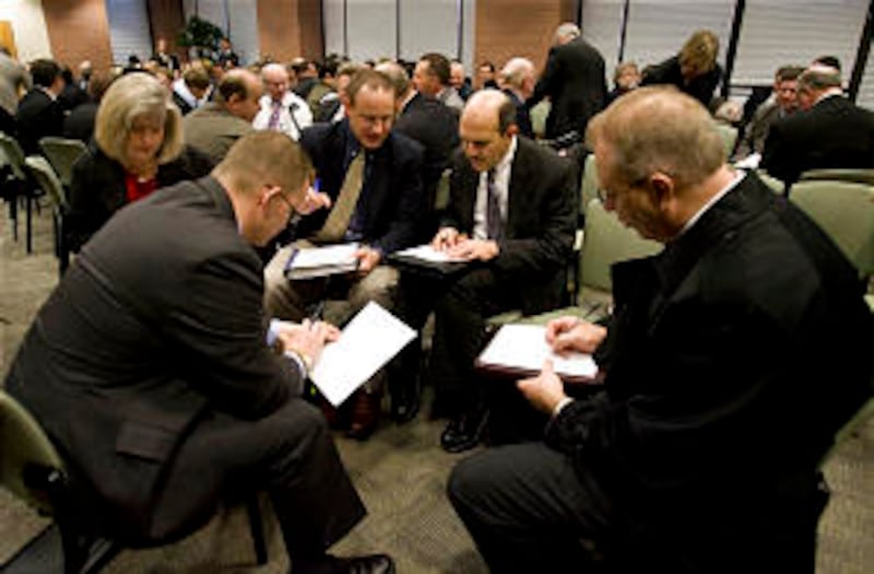 Job-hunting professionals come to LDS Business College each Monday morning to the LDS Church-sponsor