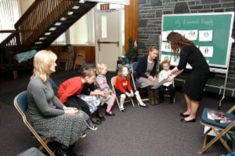 Banff Branch Primary President Laura Mooney presents a sharing time activity to a relatively small g
