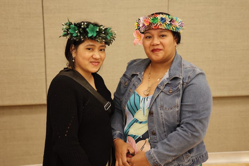 Evelynn Ehram and Juleen Robert Inowe, wearing traditional Pohnpeian headdresses, are pictured at a stake women's conference of the Asheville North Carolina Stake on Sept. 26, 2026.