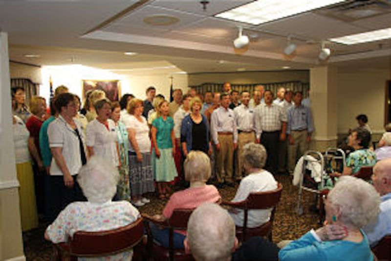 Tabernacle Choir members perform for senior health-care residence in Des Moines, Iowa. Residents wer