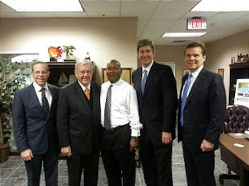 From left: Neal Rackleff, director of the Department of Housing and Community Development; Elder M.