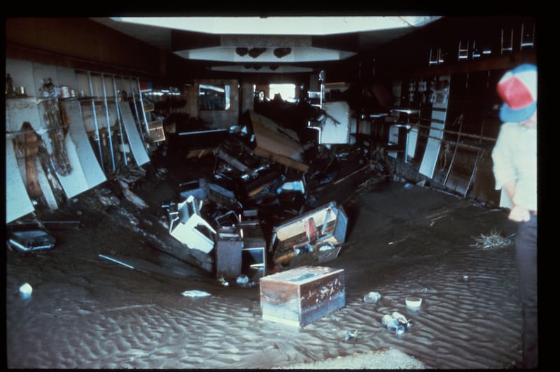 A music store on Main Street in Rexburg, Idaho, is filled with mud and debris following the Teton Dam flood on Saturday, June 5, 1976.