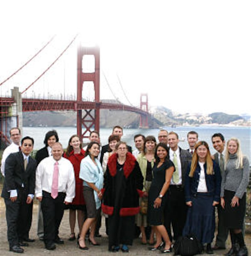 The Golden Gate Bridge towers over several members of the San Francisco (Young Single Adults) Ward,