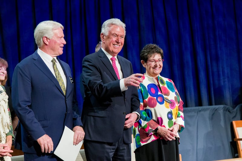 President Dieter F. Uchtdorf, acting president of the Quorum of the Twelve Apostles, and his wife, Sister Harriet Uchtdorf, smile at missionaries after a devotional at the Provo Missionary Training Center.