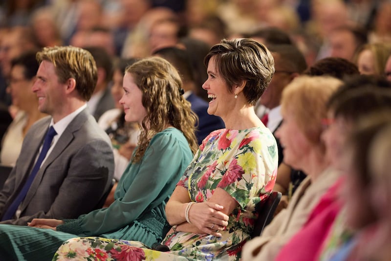 Sister Jennifer Kearon, wife of Elder Patrick Kearon of the Quorum of the Twelve Apostles, laughs as her husband speaks at the 2026 Seminar for New Mission Leaders at the Provo Missionary Training Center in Provo, Utah, on Saturday, June 20, 2026.