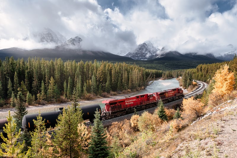 A Canadian Pacific Railway train passes through the Rocky Mountains at Morant's Curve in Banff National Park, near Calgary, Alberta, on Sept. 27, 2019.