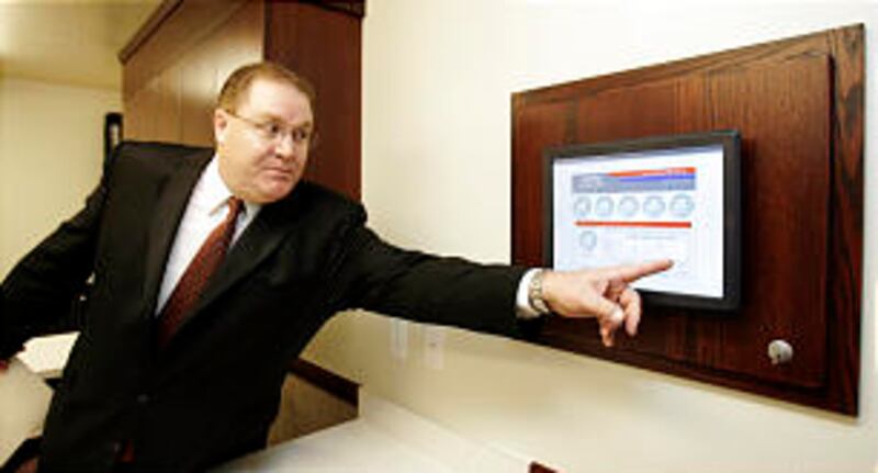 Jared Doxey describes how an educational display teaches about energy usage in a new energy-efficien