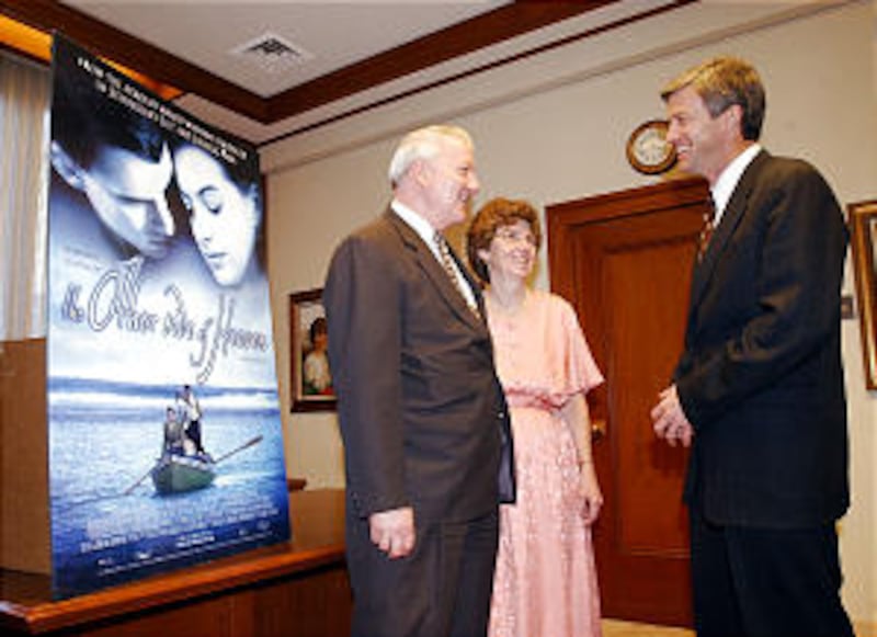 Elder and Sister John Groberg talk with director Mitch Davis Mar 27th 2002. Allred/photo (Submissio