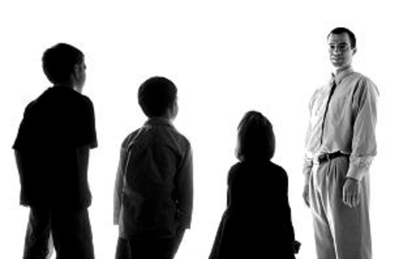 Brigham Young University Professor Joseph Price poses with his children in 2008, from left, Joseph w