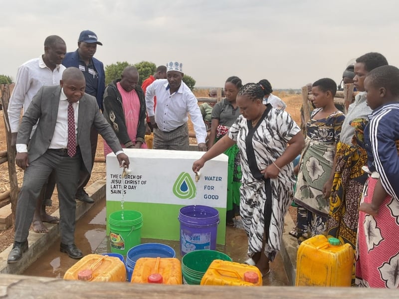 Local Church leaders open a water tap in Tanzania on Aug. 20, 2026.