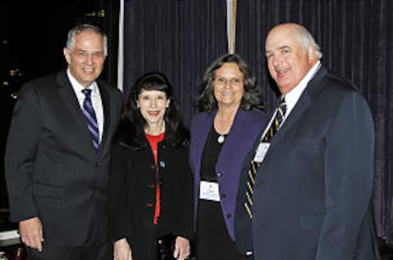 From left, Elder Neil L. Andersen, Sister Kathy Andersen, Sister Desiree Lorimer, Robert Scott Lorim