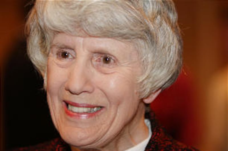 Pamela Atkinson smiles at attendees during a reception honoring her as the 2012 Distinguished Utahn