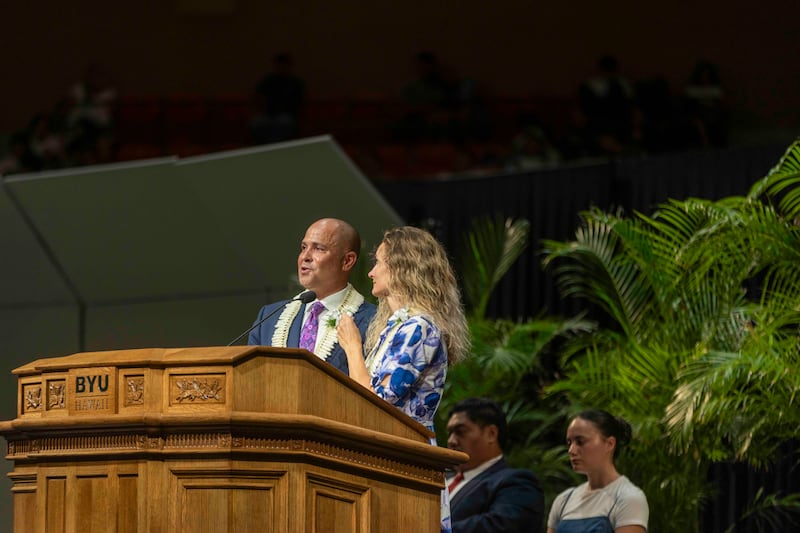 BYU–Hawaii President John S.K. Kauwe III and his wife, Sister Monica Kauwe, speak during the opening devotional of fall semester on Tuesday, Sept. 8, 2026, in the Cannon Activities Center in Laie, Hawaii.