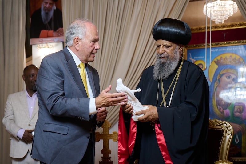 Elder Ronald A. Rasband presents a Christus statue to Abune Mathias, patriarch of the Ethiopian Orthodox Tewahedo Church, in Addis Ababa, Ethiopia, Oct. 30, 2025.