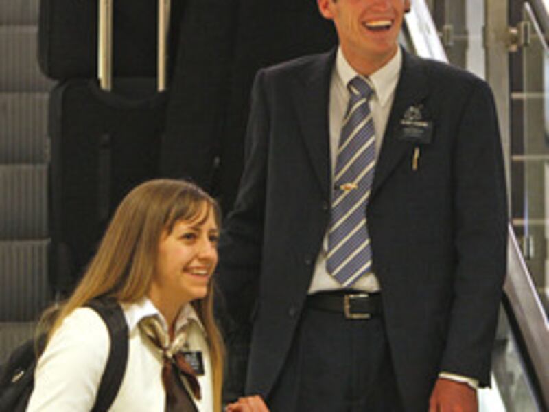 Sister and brother Breanne and Kevin Hawkins take their final steps away from full time missionary s
