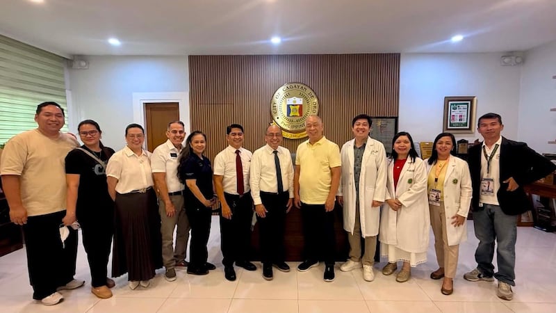 Church representatives, city leaders and hospital officials take a picture together in Cagayan de Oro, Philippines, in August 2026.
