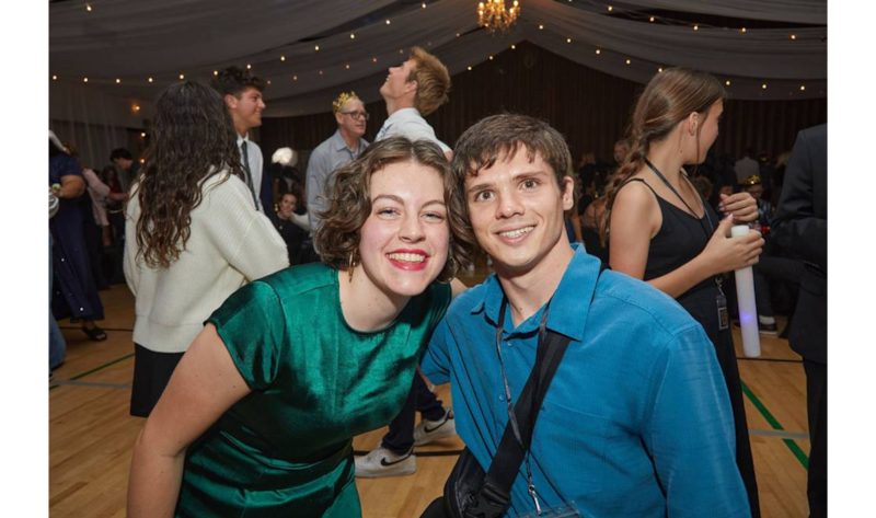 A young man and young woman pose for a photo at a Dazzle Prom put together by over 200 teenage volunteers in Orange County, California, on Saturday, April 25, 2026 as part of Global Youth Service Day.