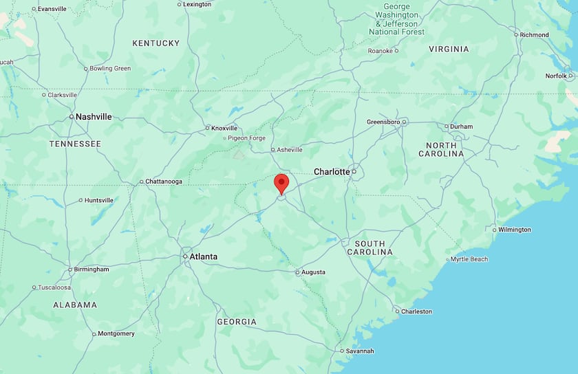 A map of South Carolina, with a pin in Greenville, in the center of the state.