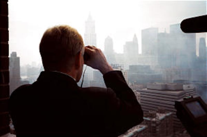 Elder W. Craig Zwick views wreckage of Ground Zero from balcony of Albert and Jean Woodhouse. Elder