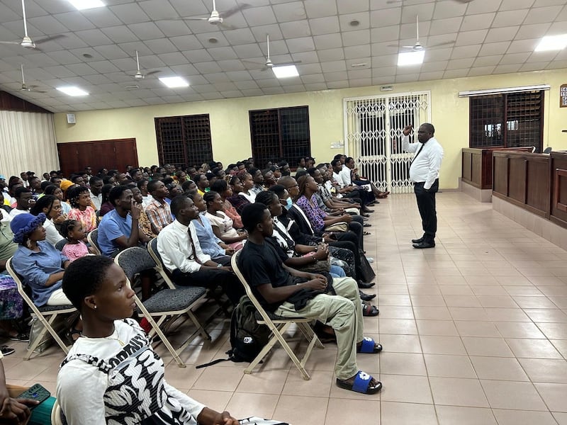 Poda Diornité, the French region director of Seminaries and Institute for the Africa West Area, addresses young single adults during a devotional held in Lomé, Togo, Sept. 29, 2025.