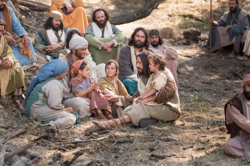 A scene from the Bible Videos portrays Jesus Christ teaching children.