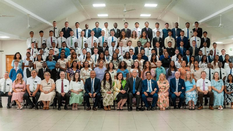 Elder Gerrit W. Gong and Sister Susan Gong take a picture with missionaries in Antananarivo, Madagascar, May 23, 2026.