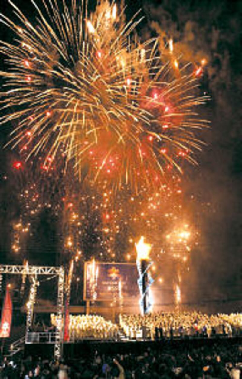 Fireworks illuminate the Feb. 8 celebration marking the first anniversary of the Winter Olympics in