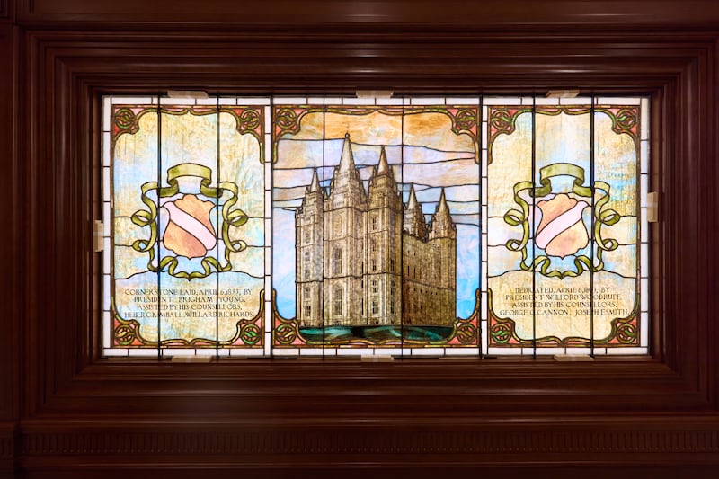 Detailed art glass on the south end of a hallway in the Salt Lake Temple in Salt Lake City on Tuesday, April 21, 2026, features significant historic milestones.