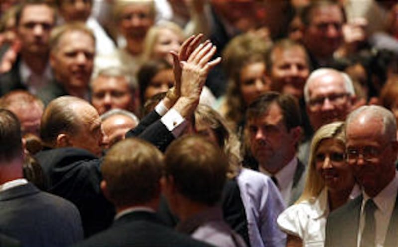 President Thomas S. Monson waves to the crowd after Golden Days, A Celebration of Life, in honor of