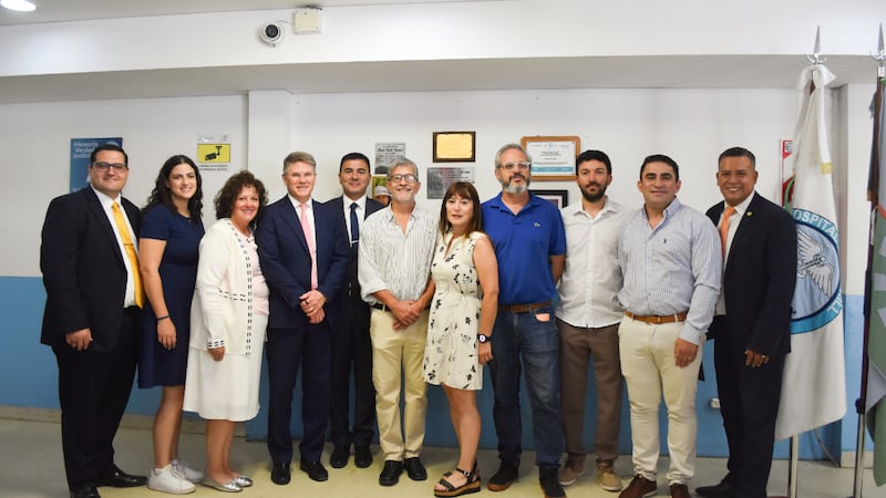 Bishop Sean Douglas, second counselor in the Presiding Bishopric, fourth from left, and his wife, Sister Ann Douglas, third from left, meet with hospital administrators and other local officials as the Church donates medical equipment to a hospital in Belén de Escobar, Buenos Aires Province, Argentina, on Feb. 14, 2026.