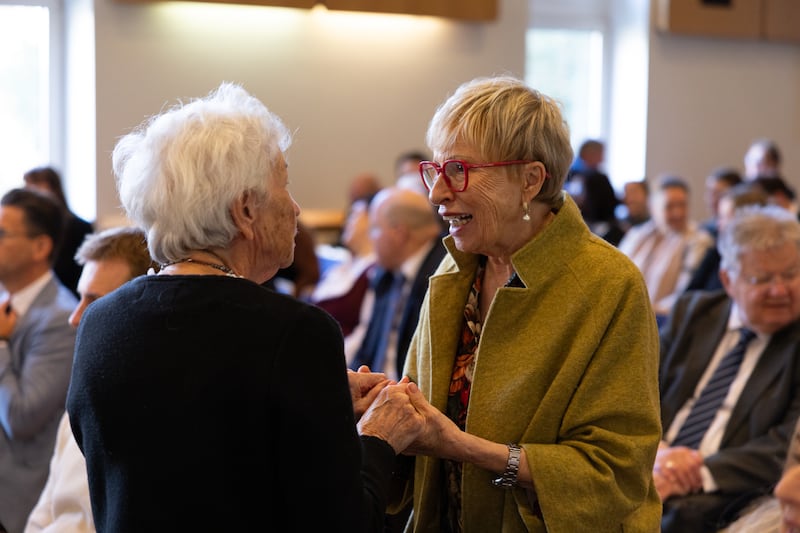 Attendees visit before the Vienna Austria Temple groundbreaking ceremony in Vienna, Austria, on Oct. 17, 2026.