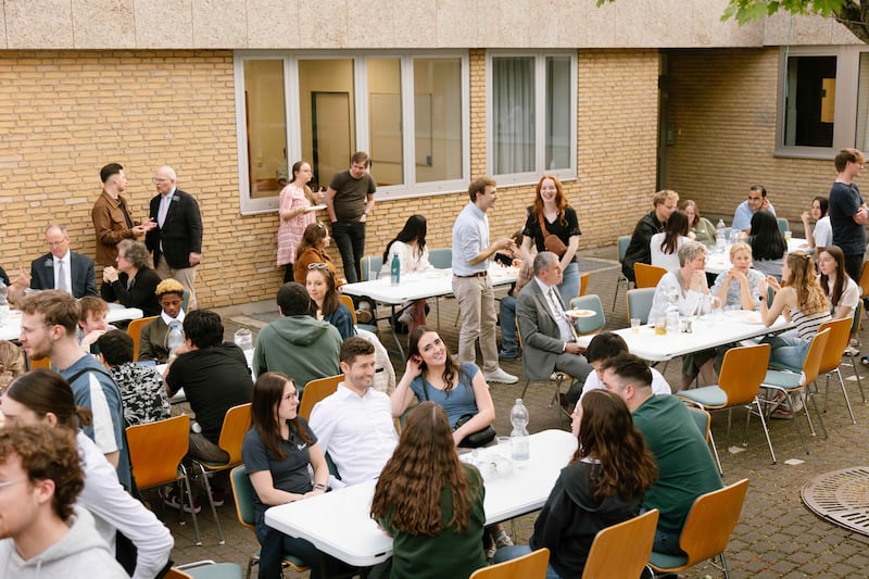 Young adults spend time together at the Frankfurt Institute of Religion in Frankfurt, Germany, April 18, 2026.