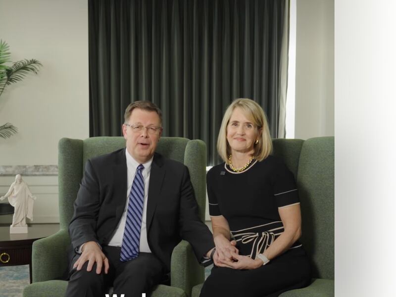 Elder Clark G. Gilbert, left, sits with his wife, Sister Christine Gilbert, right, expressing love for the young adults of the Church in a social media video posted on Feb. 12, 2026,