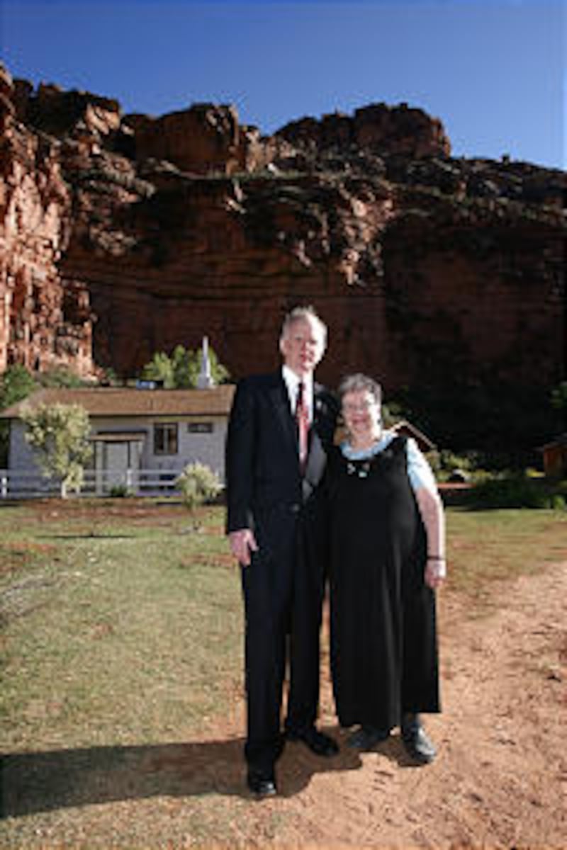 Missionaries Frank and Patricia Jasper stand by the LDS Church on the Havasupai Indian reservation