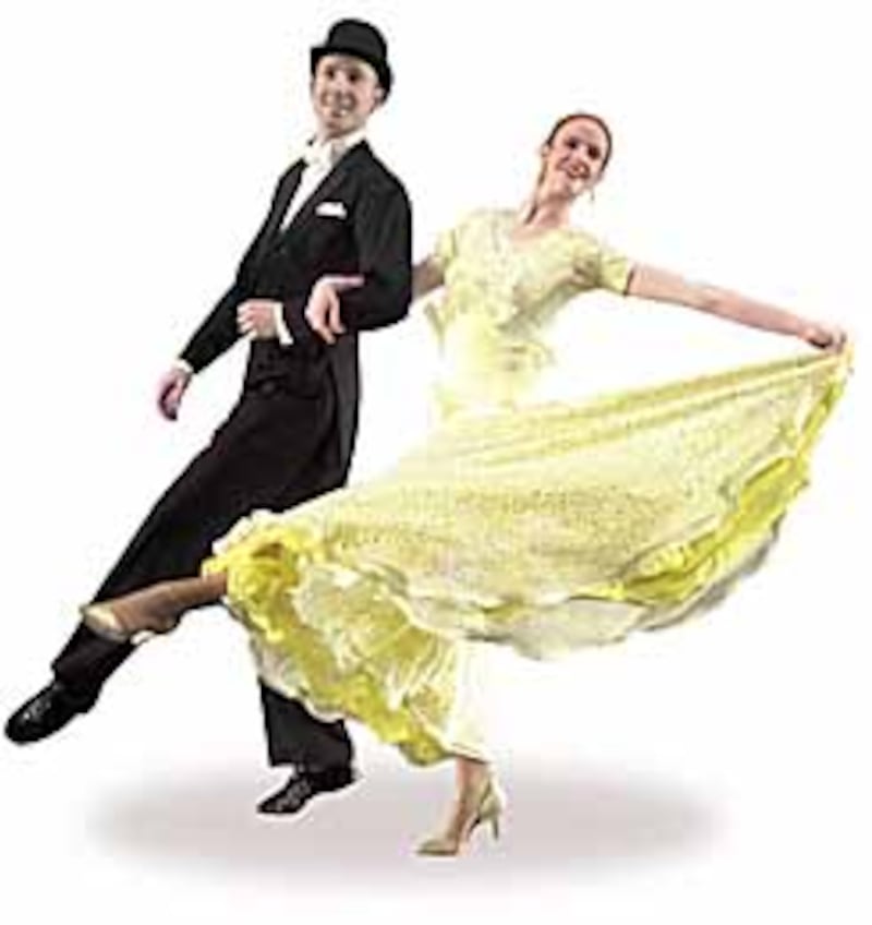 BYU ballroom dancers Elisabeth Larson and Jaren Collings perform with other members of the universit
