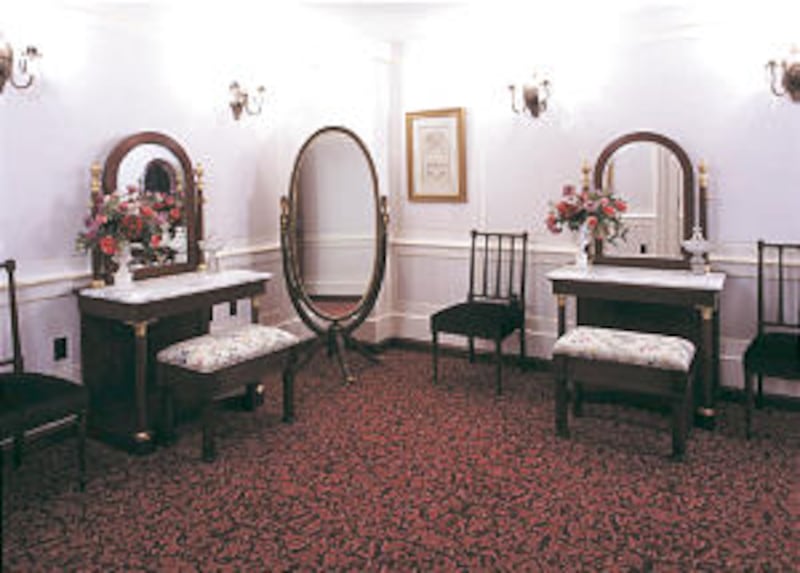 Bride's Room in Nauvoo Illinois Temple has garnet-color carpet, representative of pioneer color sche