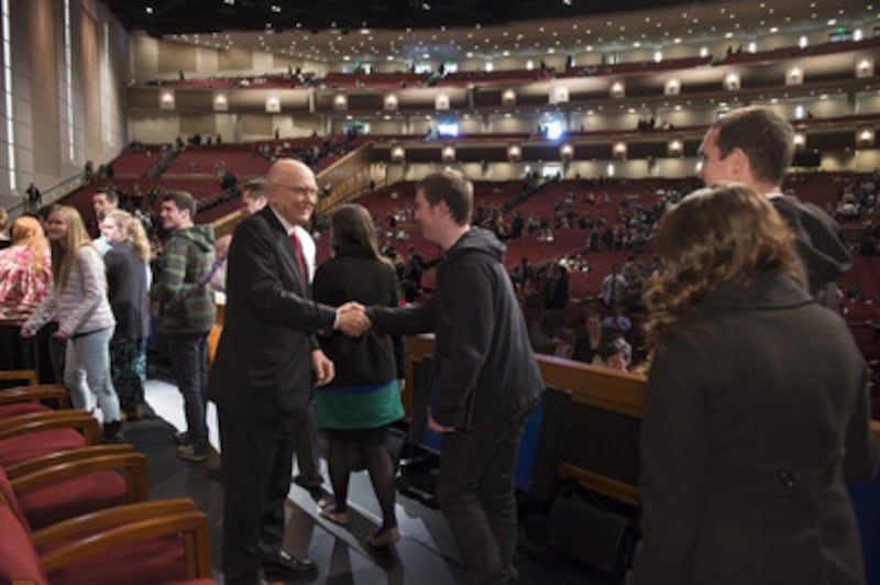 Elder Dallin H. Oaks of the Quorum of the Twelve Apostles takes time after speaking at the BYU-Idao