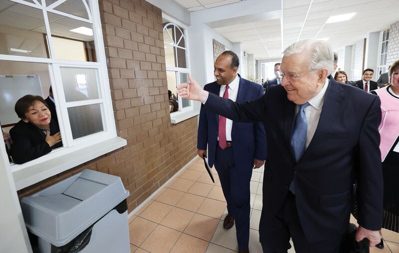President M. Russell Ballard waves to an overflow attendee after a meeting in Mexico City, Mexico