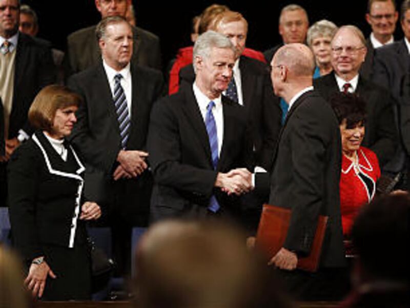 Kevin J Worthen shakes hands with President Henry B. Eyring, first consoler in the First Presidency,