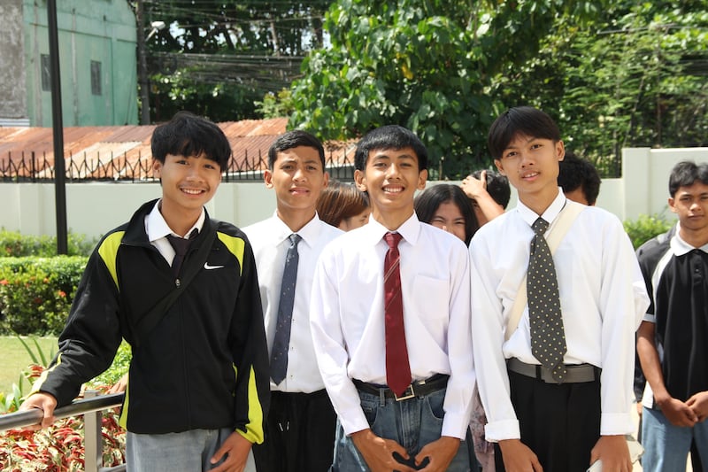 Four young men attend the Davao Philippines Temple open house on April 10, 2026.