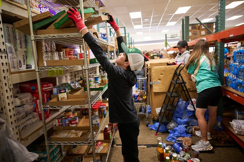 Volunteers help unload the donation from The Church of Jesus Christ of Latter-day Saints to Switchpoint in Tooele, Utah, on Thursday, May 28, 2026.
