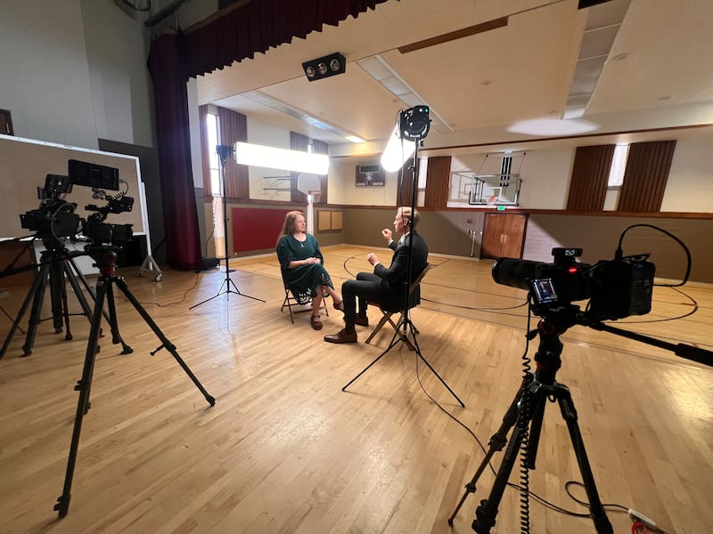 Church News reporter Mary Richards interviews collegiate and pro basketball player Parker Van Dyke in his childhood meetinghouse gym in Salt Lake City on Friday, Jan. 23, 2026.