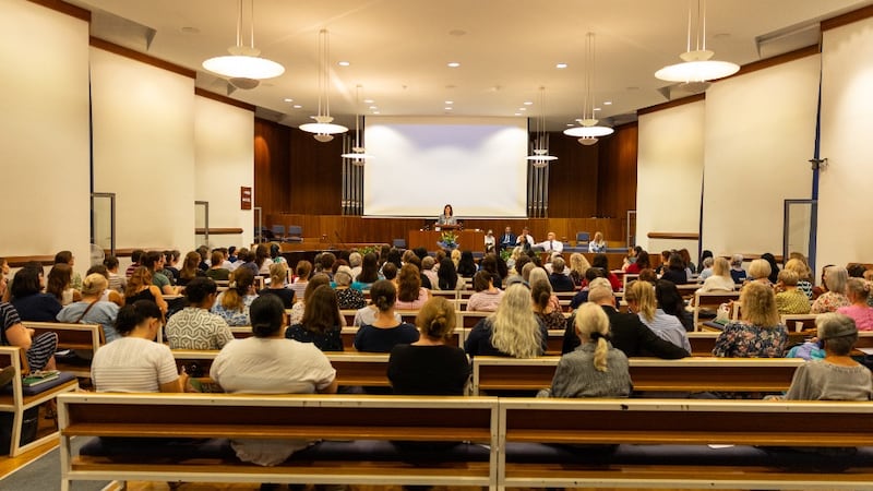Church members gather to hear from Sister Kristin M. Yee in a chapel in Vienna, Austria, Sept. 1, 2026.