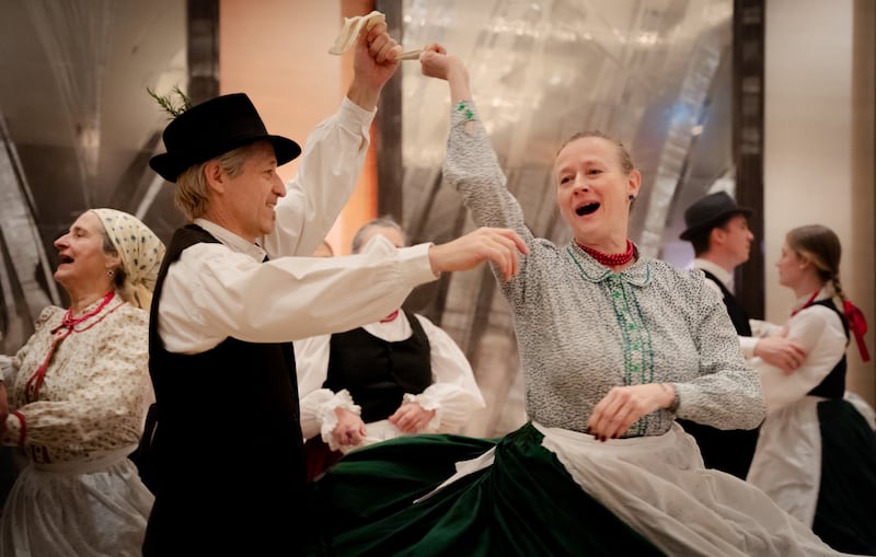 Performers dance to celebrate their culture at a Christmas dinner hosted by the Church of Jesus Christ of Latter-day Saints in Geneva, Switzerland, in Dec. 2025.