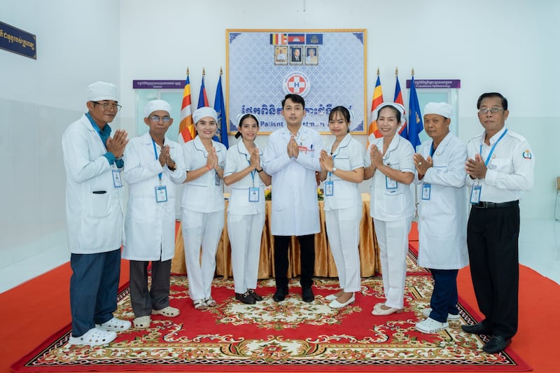 Doctors and nurses show appreciation for their new outpatient building at the Preah Net Preah Referral Hospital complex in the Banteay Meanchey province in northwestern Cambodia on Feb. 26, 2026.
